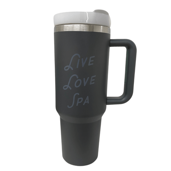 Black insulated travel mug with handle and white lid featuring "Live Love Spa" text, designed for hydration during skincare and wellness routines, Live Love Spa Retro 40 oz Tumbler | Live Love Spa.