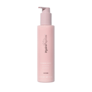 Bottle of Cashmere Cleanse | HydroPeptide facial rose milk cleanser in a soft pink pump container, designed for gentle skincare and facial cleansing.