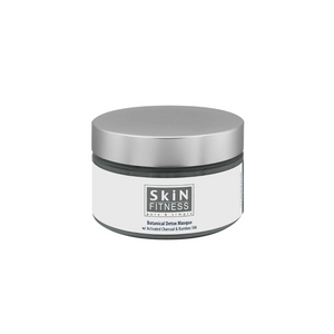 Jar of Botanical Detox Masque | Skin Fitness Therapy with a silver lid and minimalist white label featuring activated charcoal and bamboo silk for skincare.