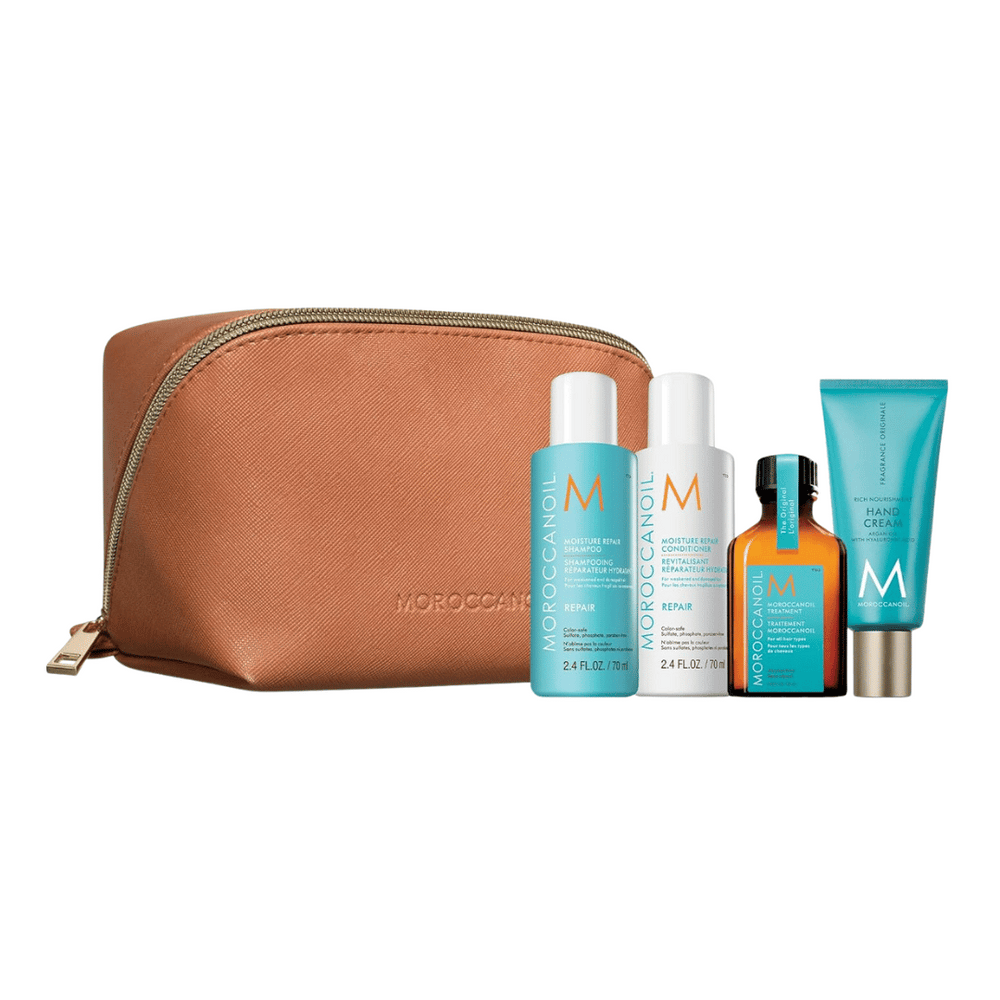 Repair Travel Kit | Moroccanoil featuring a tan textured zippered pouch with travel-size haircare products including shampoo, conditioner, oil treatment, and hand cream.