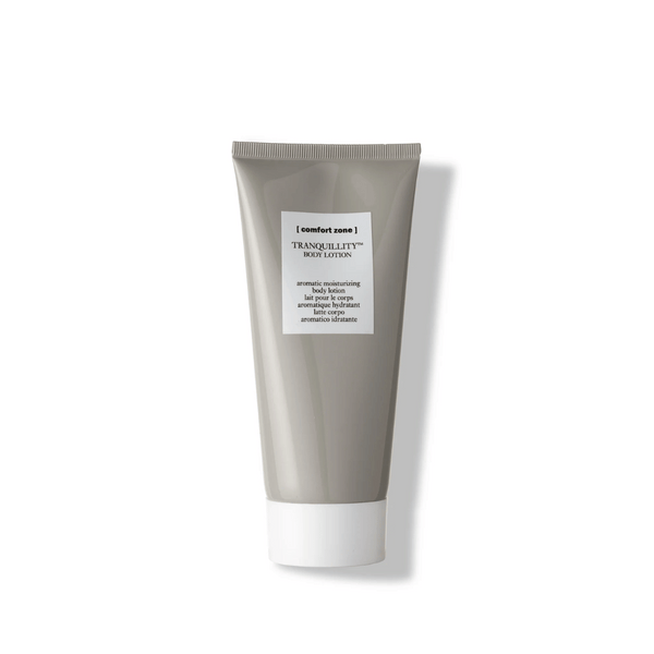 Tranquillity Body Lotion | [ comfort zone ] in a sleek gray tube with white cap, moisturizing skincare product designed for calming and hydrating body care.