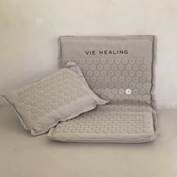 Linen Acupressure Mat | Vie Healing in neutral tones featuring textured acupressure points designed for wellness and body care recovery support.