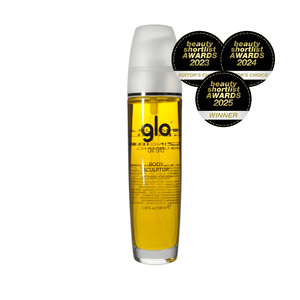 Clear bottle of Oil910 | Glo910 body sculptor oil with a white pump dispenser, highlighted with three beauty shortlist awards from 2023 to 2025 for skincare excellence.
