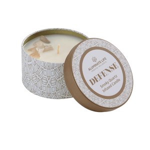 Open tin candle labeled Defense Candle Tin 6 oz | Aluminate Life featuring a smokey quartz infused candle in a decorative patterned container promoting wellness and relaxation.