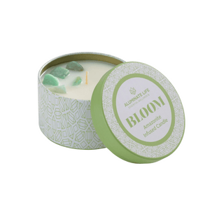 Open Bloom Candle Tin 6 oz | Aluminate Life with Amazonite stones embedded in the wax inside a decorative light green patterned container designed for wellness and relaxation.