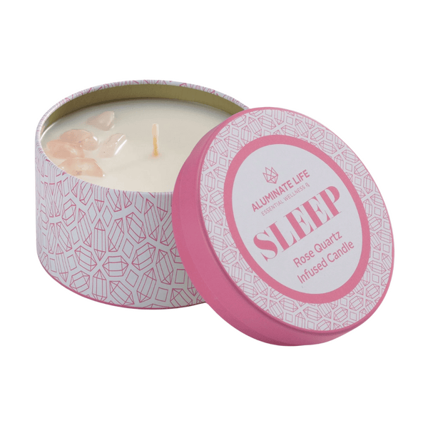 Open pink tin candle with small rose quartz crystals on the surface of the wax, labeled Sleep Candle Tin 6 oz | Aluminate Life, designed for wellness and relaxation.