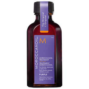 Bottle of Moroccanoil Treatment Purple | Moroccanoil with a purple label designed for blonde, lightened, or grey hair to neutralize brassiness.