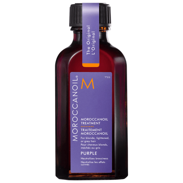 Bottle of Moroccanoil Treatment Purple | Moroccanoil with a purple label designed for blonde, lightened, or grey hair to neutralize brassiness.