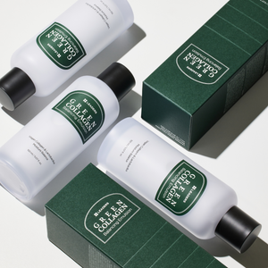 Four bottles and two boxes of Green Collagen Balancing Emulsion | Leaders skincare product displayed with white bottles, black caps, and dark green labels and packaging.