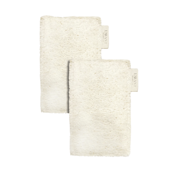 Two natural beige scrubbing sponges made from eco-friendly materials with L'AVANT Collective tags, labeled Eco-Friendly Dish Sponges - Set of 2 | L'AVANT Collective.