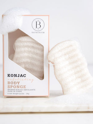 Konjac Walnut Exfoliating Body Sponge | Bathorium displayed with lathered foam, showing natural texture designed for gentle skincare exfoliation and body care wellness.