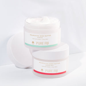 Two jars of Nourishing Body Butter | Pure Fiji with one open showing creamy texture, featuring Moringa and Dragon Fruit varieties.