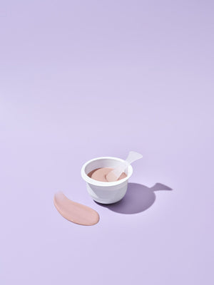 3X Boosting Modeling Mask - Collagen | Leaders pink creamy skincare mask in a white container with spatula, next to a smooth swatch on a lavender background.