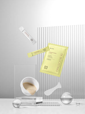3X Boosting Modeling Mask - Vitamin | Leaders skincare set with creamy mask in a white container, yellow sachet, and applicator against a minimalist background.