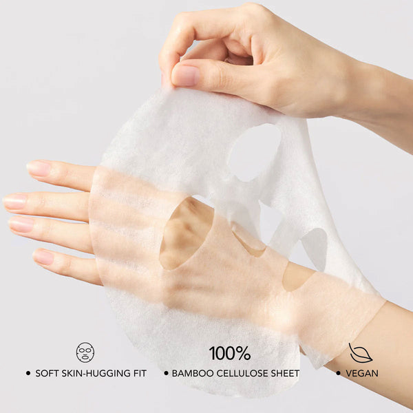 A delicate, translucent sheet mask being gently held and stretched over a hand, showcasing the soft skin-hugging fit of the PDRN 0.5% Lifting Mask | Leaders made with 100% bamboo cellulose and vegan ingredients.