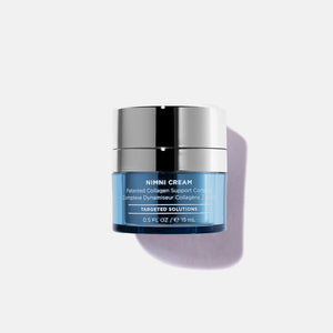 Nimni Cream .5 oz | HydroPeptide in a small blue jar with silver lid, skincare product designed for collagen support and targeted skin solutions.