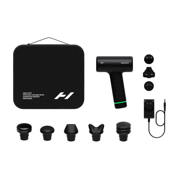 Compact black Hypervolt 3 | Hyperice massage device with five interchangeable heads, a charging adapter with multiple plugs, and a sleek black carrying case for recovery and wellness.