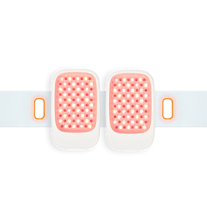 Close-up of the Recovery Loop | LightStim device with dual rectangular light panels emitting red and near-infrared LEDs on a white adjustable strap for targeted skincare and wellness therapy.