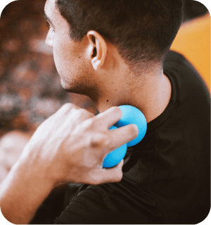 A person using the RAD Roller Original | RAD, a blue recovery tool, to massage the neck and promote muscle relaxation and wellness.