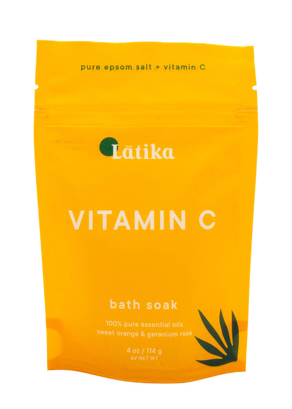 Bright yellow packaging of Bath Soak | Latika enriched with pure epsom salt, vitamin C, and essential oils of sweet orange and geranium rose for a refreshing skincare experience