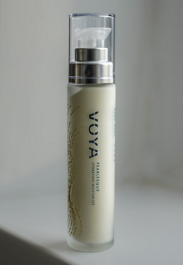 Pearlesque Hydrating Moisturiser | VOYA in a sleek frosted bottle with a clear pump dispenser, designed for nourishing skincare and hydration.