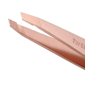 Close-up of the precision tip of the Rose Gold Slant Tweezer | Tweezerman, designed for accurate and gentle hair removal with a sleek rose gold finish.