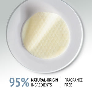 Close-up of a textured skincare pad on a white plate, representing Sublime Skin Peel Pads | [ comfort zone ] made with 95 percent natural-origin ingredients and fragrance free.