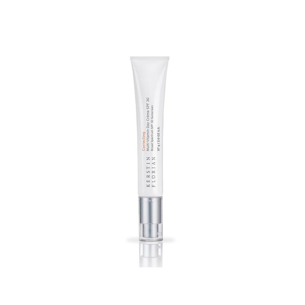 Slim white tube container of Correcting Multi-Vitamin Day Creme | Kerstin Florian with silver pump cap designed for skincare and daily skin protection.