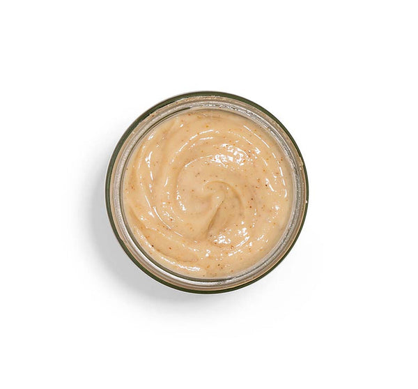 Top view of a jar containing Finely Awake Plantfoliant Silkening Face Cleansing Polish | Farmhouse Fresh, showing its creamy, textured skincare formula.