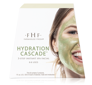 Packaging of Hydration Cascade® 3-step Instant Spa Facial | Farmhouse Fresh showing product name and a smiling woman with a green facial mask applied to half of her face.