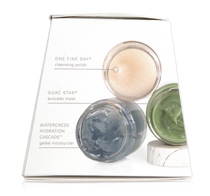 Clear display of three skincare products in glass jars labeled One Fine Day® cleansing polish, Guac Star® avocado mask, and Watercress Hydration Cascade™ gelée moisturizer from Hydration Cascade® 3-step Instant Spa Facial | Farmhouse Fresh.