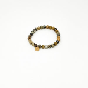 Assorted Satya Bracelets | Satya featuring natural stone beads in earthy tones with a small gold-colored charm, perfect for wellness and mindful accessory collections.