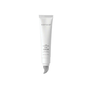 White tube of NuFACE FIX® Serum | NuFACE with a curved applicator tip designed for targeted skincare application to smooth fine lines.