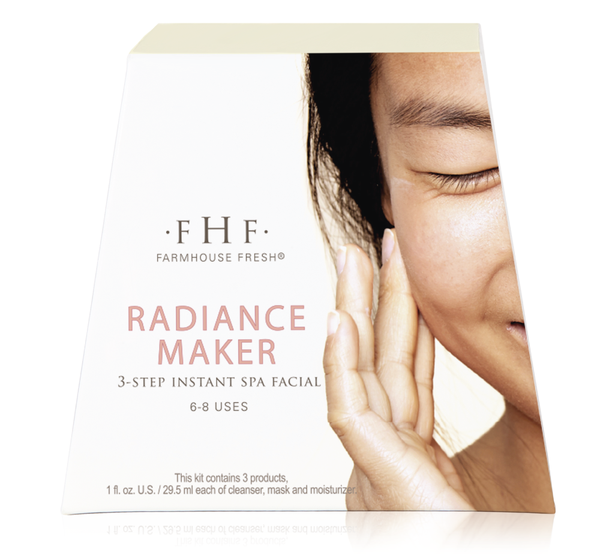 Packaging of Radiance Maker 3-step Instant Spa Facial | Farmhouse Fresh featuring a close-up of a smiling person gently touching their face, highlighting skincare and wellness.