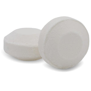 Two white round shower steamer tablets with smooth surfaces, designed for invigorating aromatherapy in the shower, Energize Shower Steamer | Primal Elements.