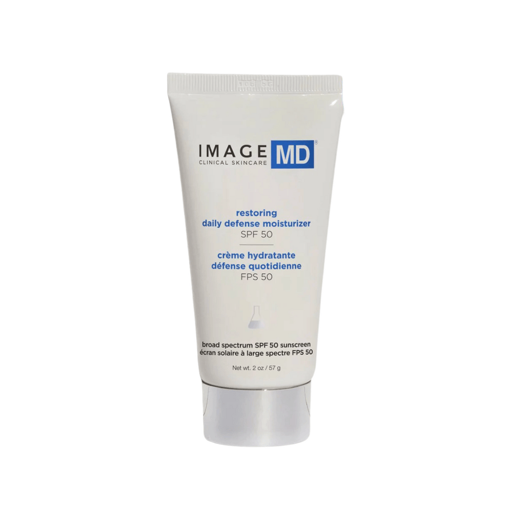 Tube of Restoring Daily Defense Moisturizer SPF 50 | IMAGE Skincare with white and blue packaging, designed for daily skincare and broad spectrum sun protection.