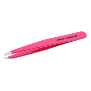 Pink Slant Tweezer | Tweezerman with angled tips designed for precise hair removal and grooming in skincare and body care routines.