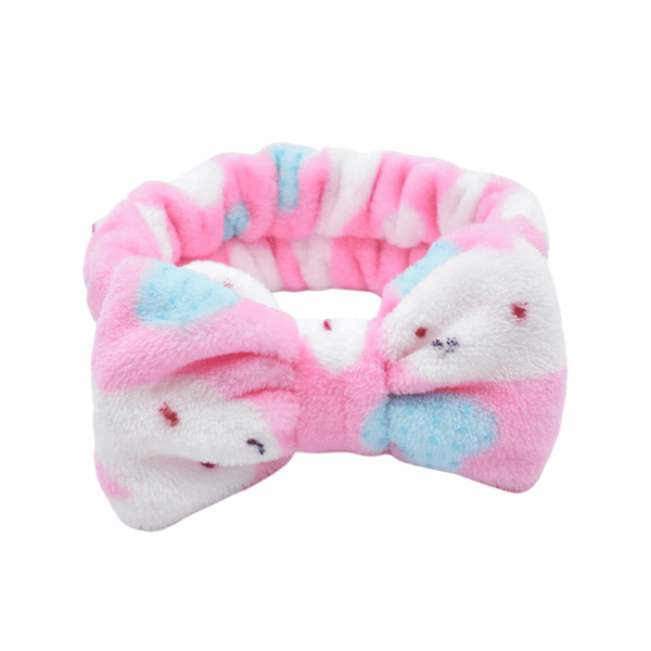 Soft plush Spa Headbands | Live Love Spa in pastel pink, white, and blue with a bow design, perfect for skincare and wellness routines.