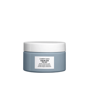 Sleek gray jar with white lid containing Sublime Skin Peel Pads | [ comfort zone ], designed for gentle double exfoliation in skincare routine.