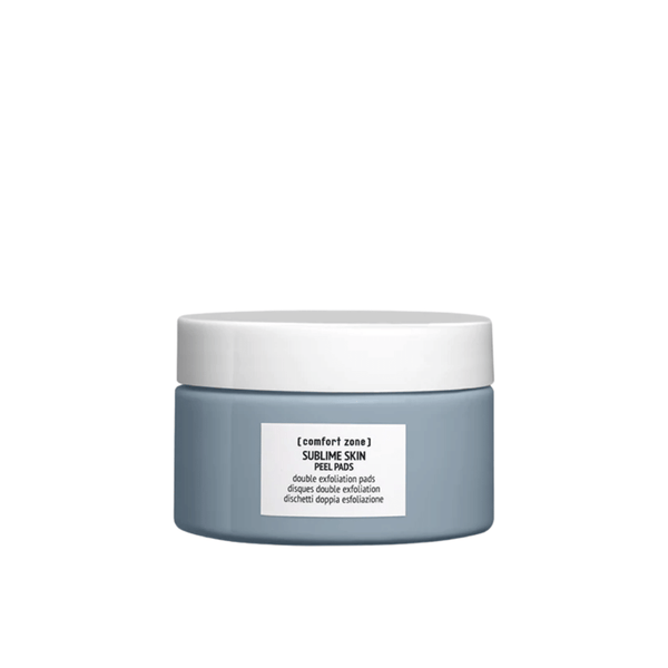 Sleek gray jar with white lid containing Sublime Skin Peel Pads | [ comfort zone ], designed for gentle double exfoliation in skincare routine.