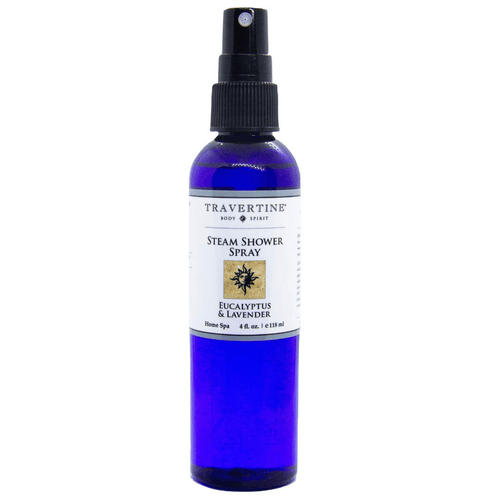 Blue spray bottle of Eucalyptus + Lavender Steam Shower Spray | Travertine Spa with a black spray nozzle and white label for body care and wellness.