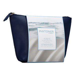Navy blue cosmetic pouch containing the Purifying Starter Kit | Phytomer skincare set, designed for cleansing and purifying the skin with a serene ocean-themed label.