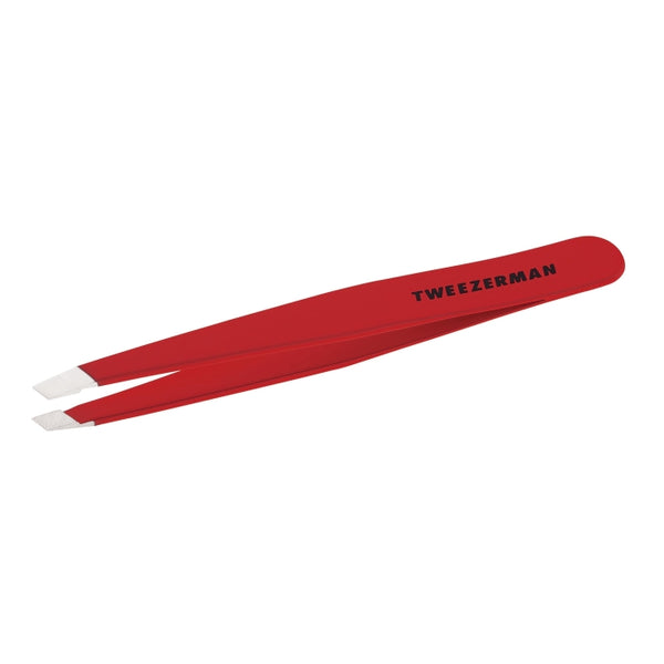 Red precision slant tweezers with angled tips designed for accurate hair removal and grooming, branded with Tweezerman, ideal for skincare and beauty routines.