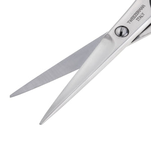 Close-up view of stainless steel moustache scissors with sharp, pointed blades from Moustache Scissors & Comb | Tweezerman, designed for precise grooming.