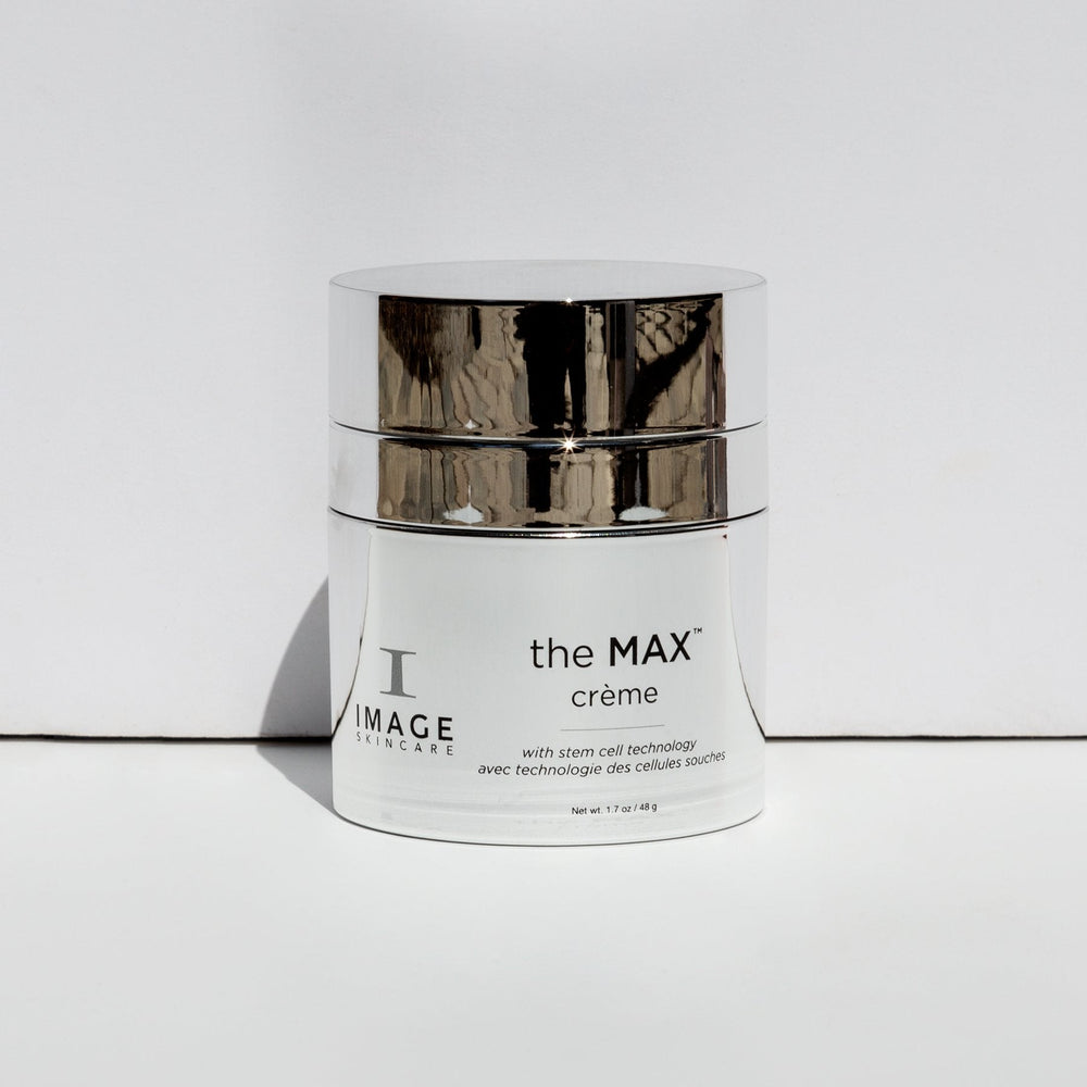 Jar of the MAX™ crème | IMAGE Skincare with reflective silver lid and white body, designed for advanced skincare using stem cell technology.