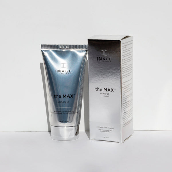 Silver tube and matching box of the MAX™ masque | IMAGE Skincare, a skincare product designed for facial treatment and rejuvenation.