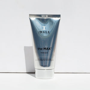 Silver and white tube of the MAX™ masque | IMAGE Skincare standing against a plain white background, featuring sleek modern packaging designed for skincare and wellness use.